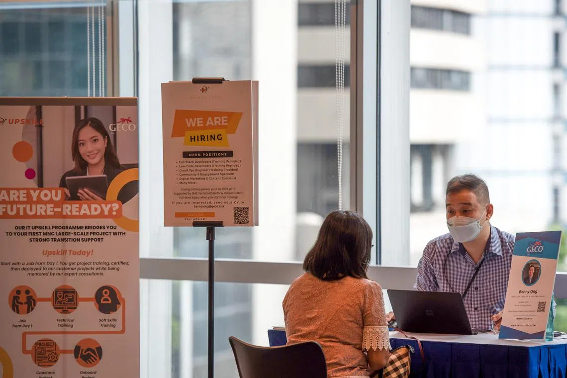 ocjob - Photo of a job hunter speaking with a career 

Credit: NTUC