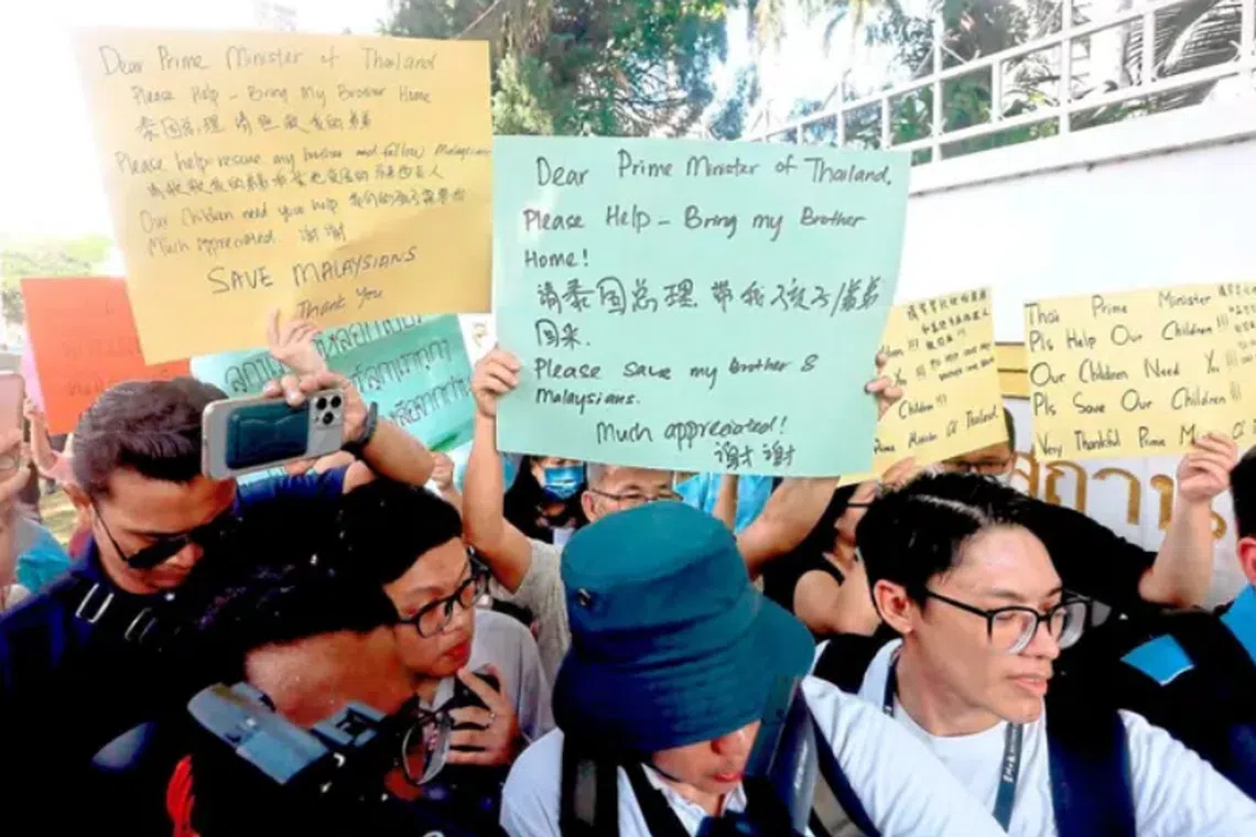 The group of some 40 people claimed that Malaysians had been lured by crime syndicates offering fake jobs and were being held against their will.