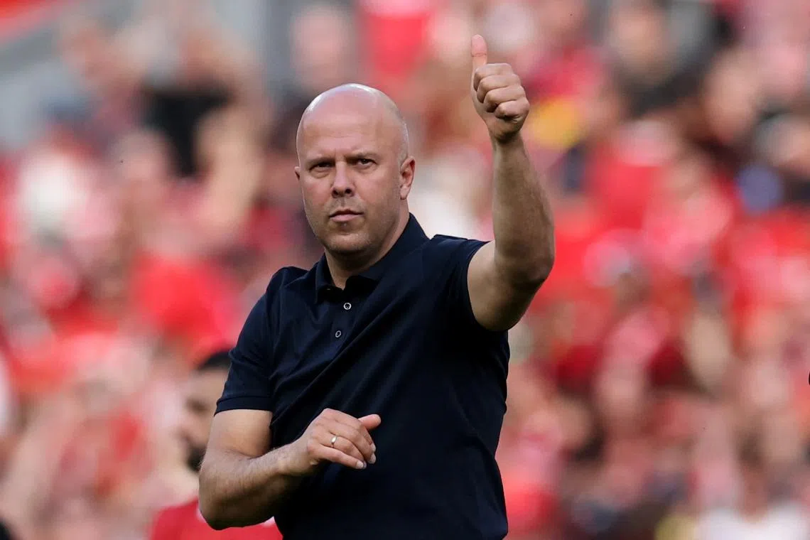 FILE PHOTO: Soccer Football - Premier League - Liverpool v Arsenal - Anfield, Liverpool, Britain - May 11, 2025 Liverpool manager Arne Slot celebrates after the match REUTERS/Phil Noble/File Photo