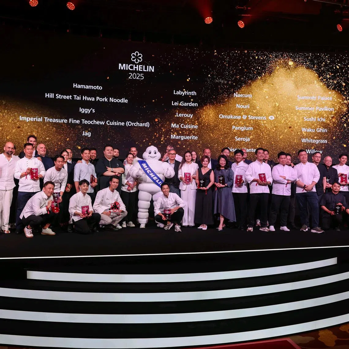 Representatives of Singapore's one-Michelin-starred restaurants take the stage at the annual award ceremony
