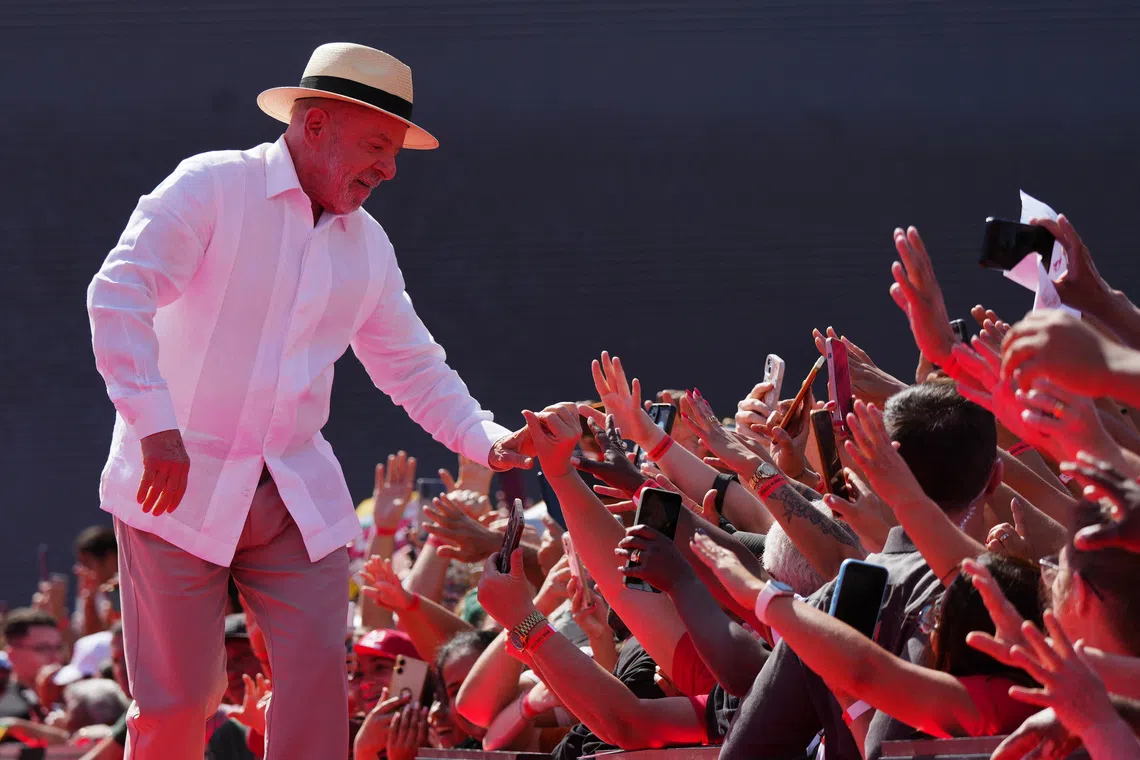 Brazilian President Luiz Inacio Lula da Silva greets supporters as he launches his reelection campaign at Primeiro de Maio Stadium in Sao Bernardo do Campo, Brazil, August 16, 2026.  REUTERS/Alexandre Meneghini