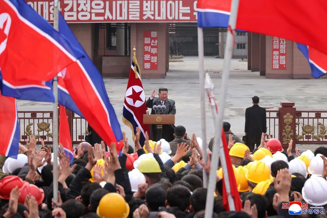 North Korean leader Kim Jong Un delivers a speech during his visit to the Sangwon Cement Complex in North Hwanghae province of North Korea on March 1.