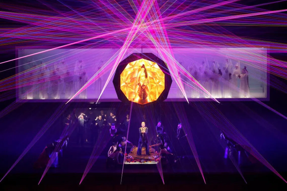 Cast members perform Giacomo Puccini's Turandot with immersive laser lights created by 'teamLab' during a dress rehearsal at Tokyo Bunka Kaikan in Tokyo, Japan. PHOTO : REUTERS