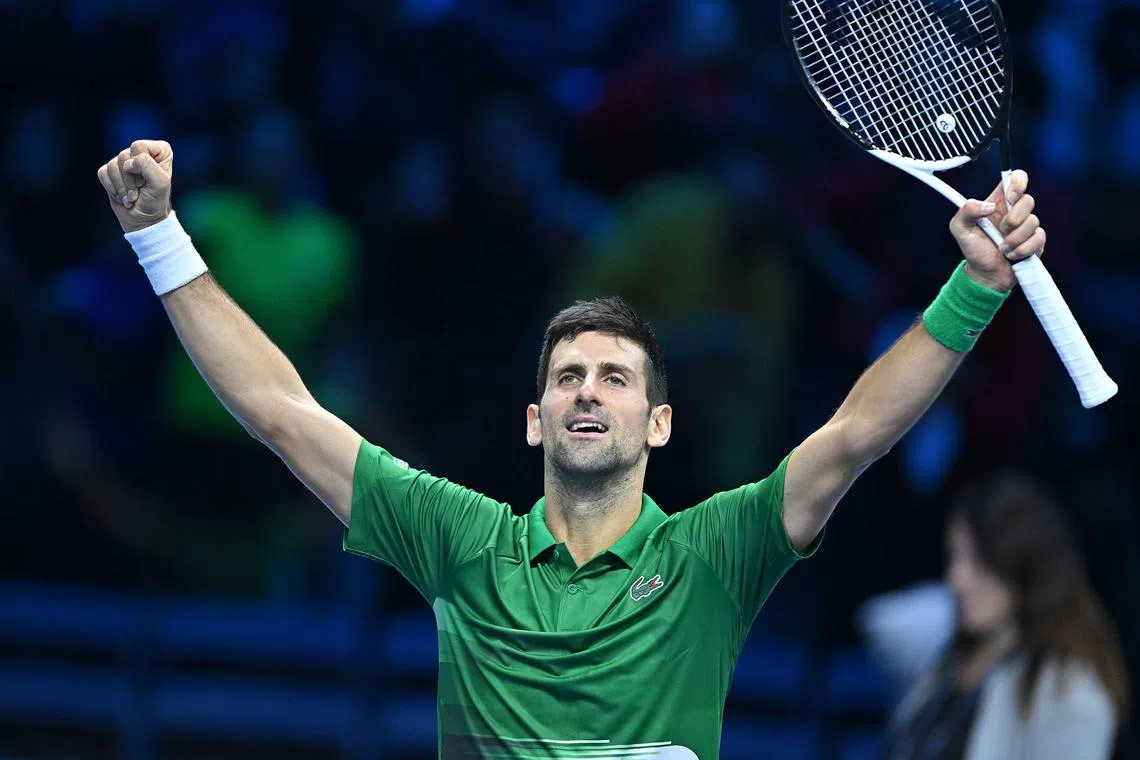 Novak Djokovic of Serbia celebrates after defeating Daniil Medvedev of Russia.