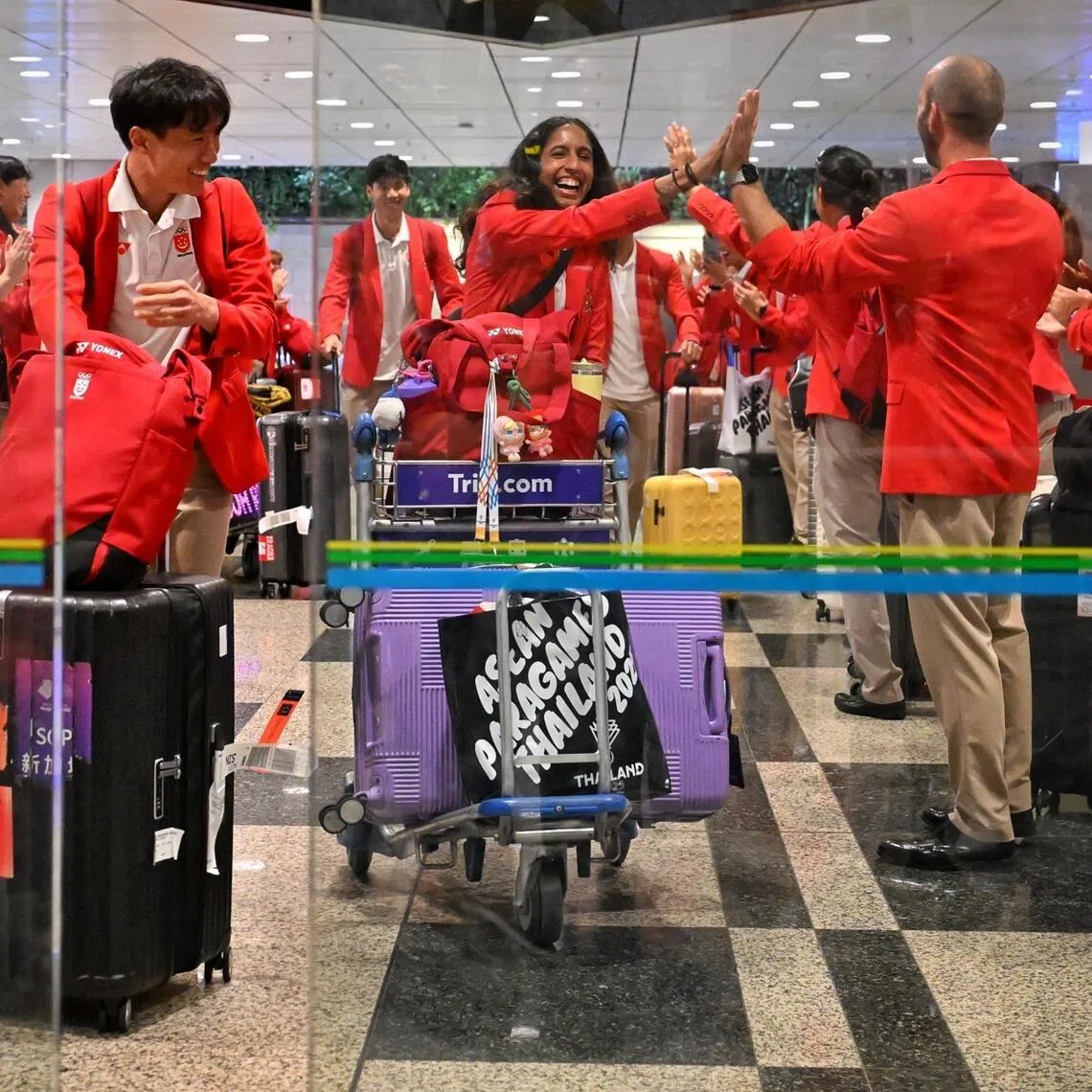From second right: Shanti Pereira and Calvin Quek and the rest of athletics contingent arriving at Changi Airport Terminal 3, following the conclusion of their 2025 SEA Games campaign on Dec 17, 2025.