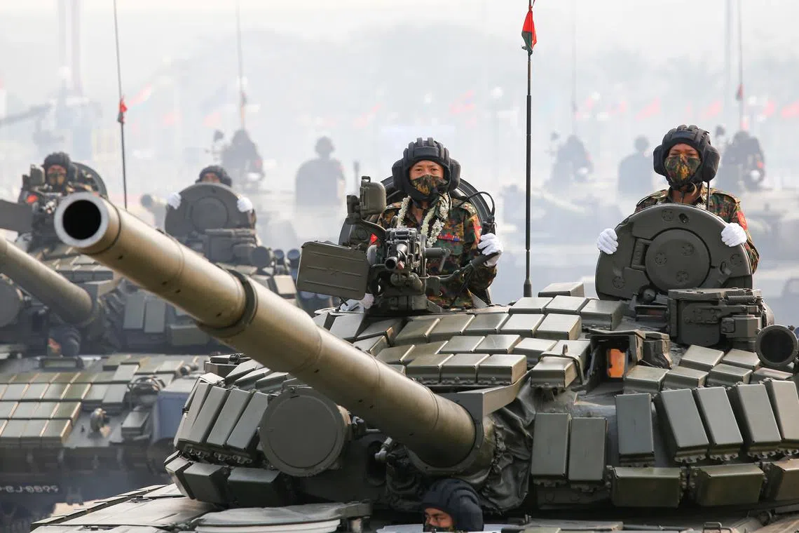 Military personnel in tanks participates in a parade on Armed Forces Day in Naypyitaw, Myanmar, March 27, 2021. REUTERS/Stringer/File Photo