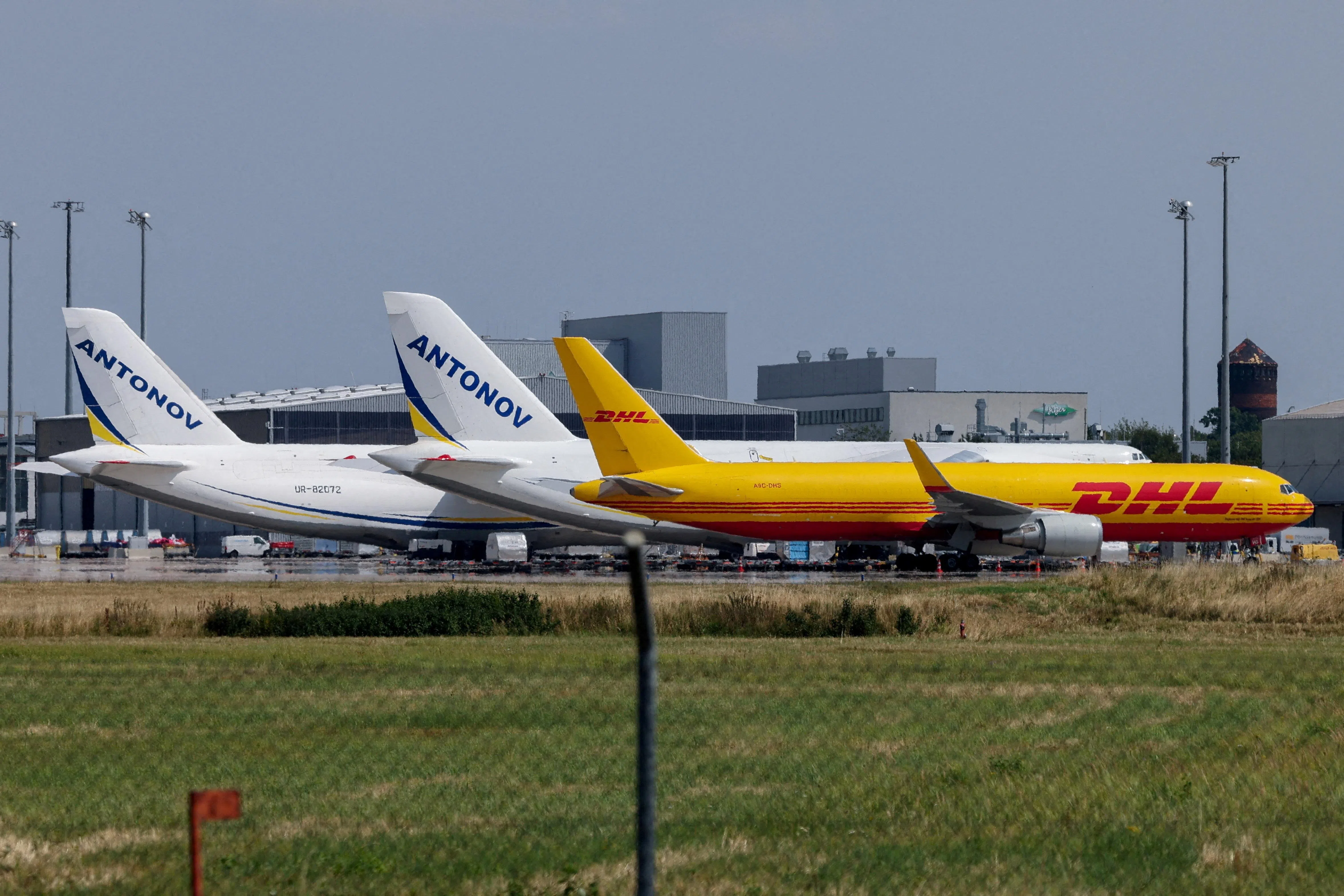 A DHL cargo plane and Ukrainian Antonov cargo planes at Leipzig/Halle Airport on Aug 5.