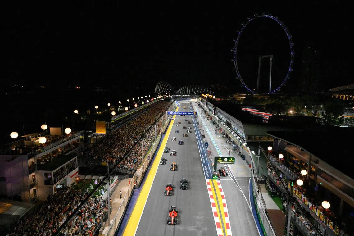 Carlos Sainz leading the pack during the Formula One Singapore Airlines Singapore Grand Prix at Marina Bay street circuit on Sept 17.
