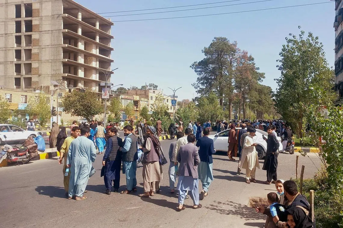 People gather on the streets in Herat city, following a 6.3 magnitude earthquake that struck western Afghanistan. 