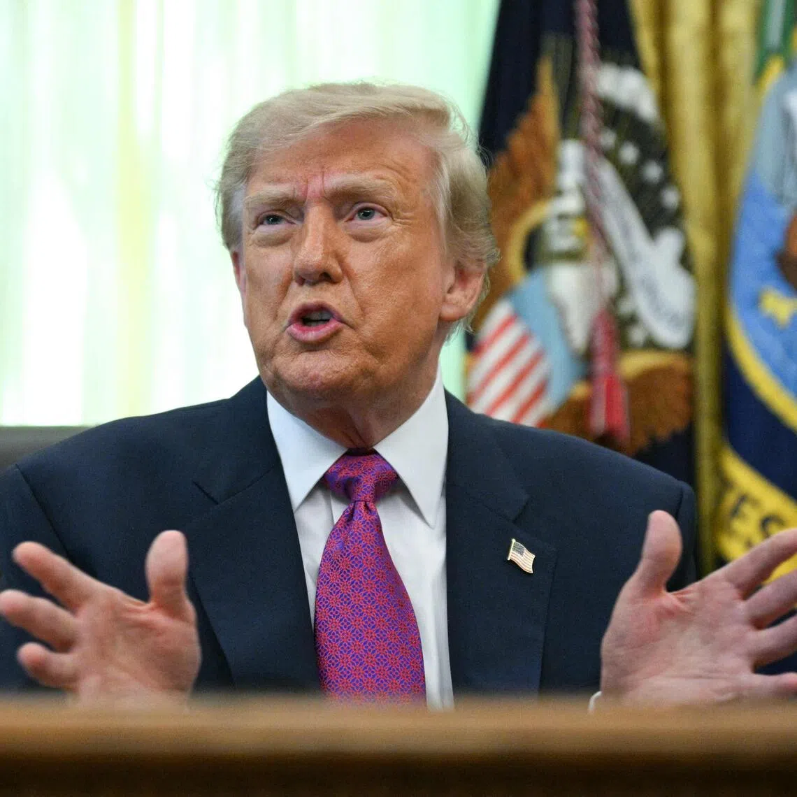 US President Donald Trump speaking to reporters at the White House on Aug 27.