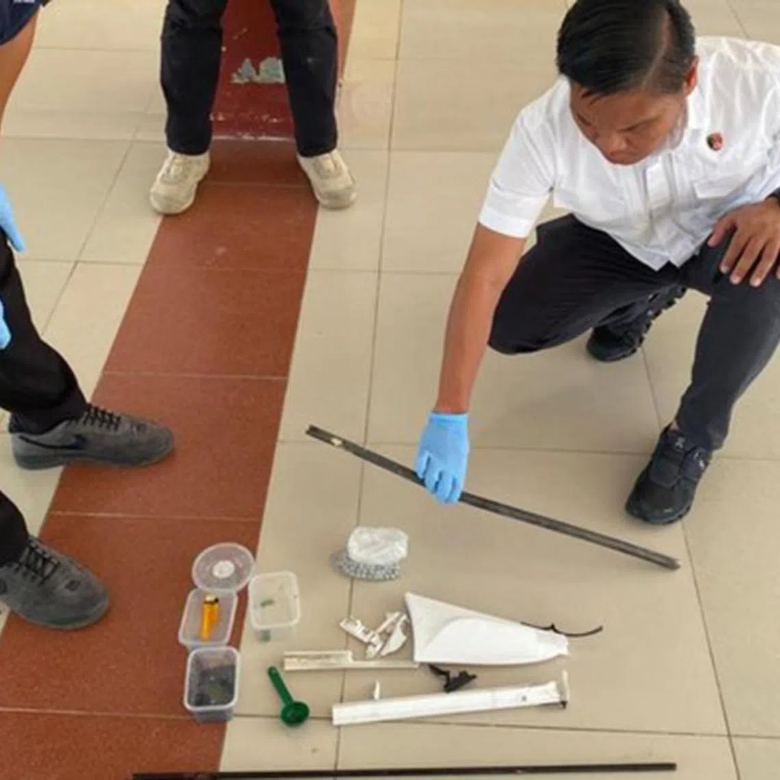 Police at the location and securing a number of pieces of evidence. 