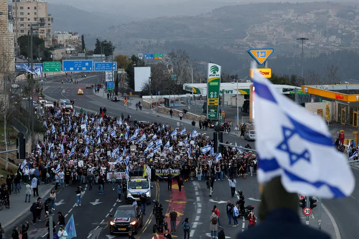 Families and supporters of hostages kidnapped in the deadly October 7 attack on Israel by the Palestinian Islamist group Hamas, take part in the four day march from Reim to Jerusalem to call for the release of hostages, as they enter in Jerusalem, March 2, 2024. REUTERS/Ronen Zvulun