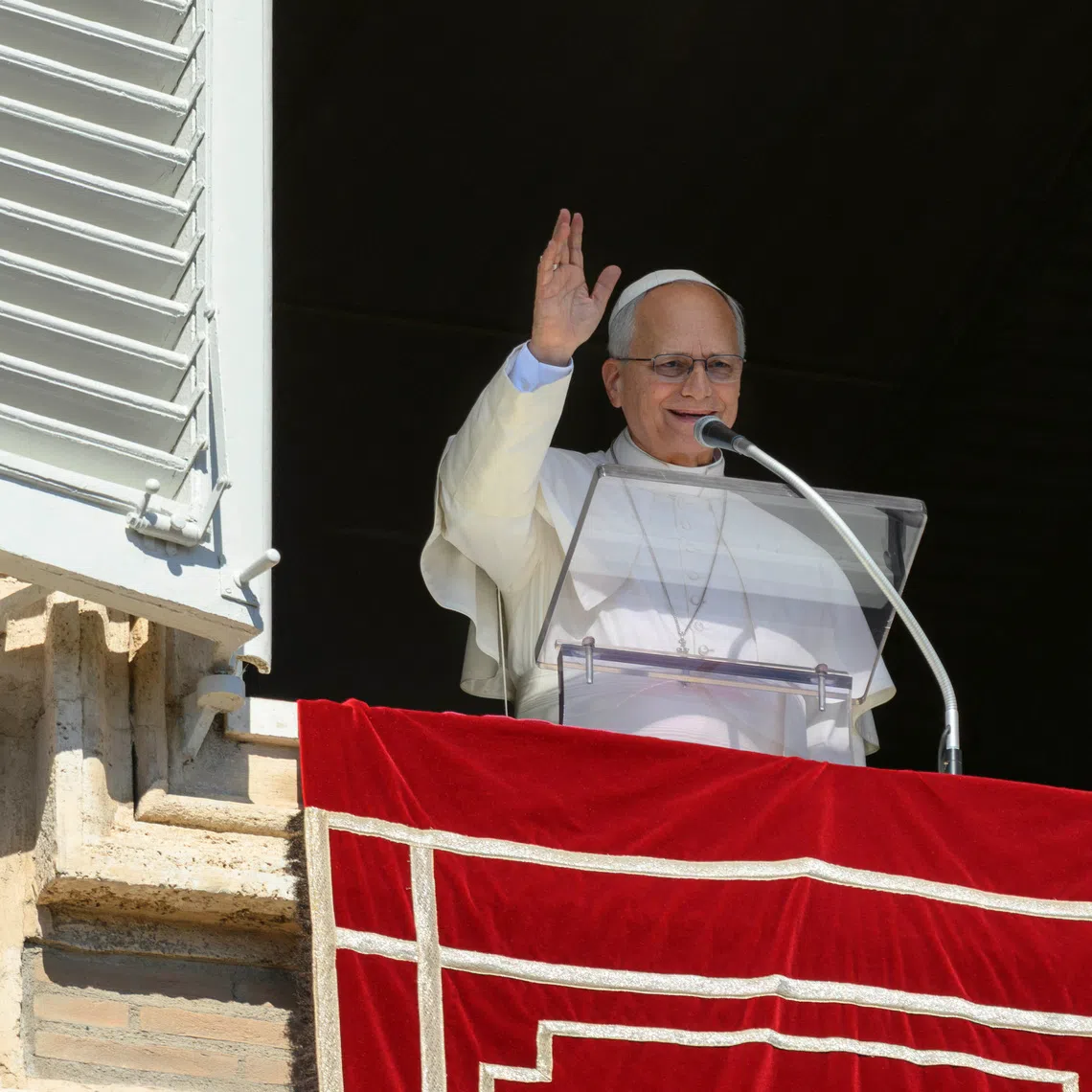 Pope Leo leads the Angelus prayer from the window of the Apostolic Palace at the Vatican, October 11, 2026. Vatican Media/Elisabetta Trevisan/­Handout via REUTERS