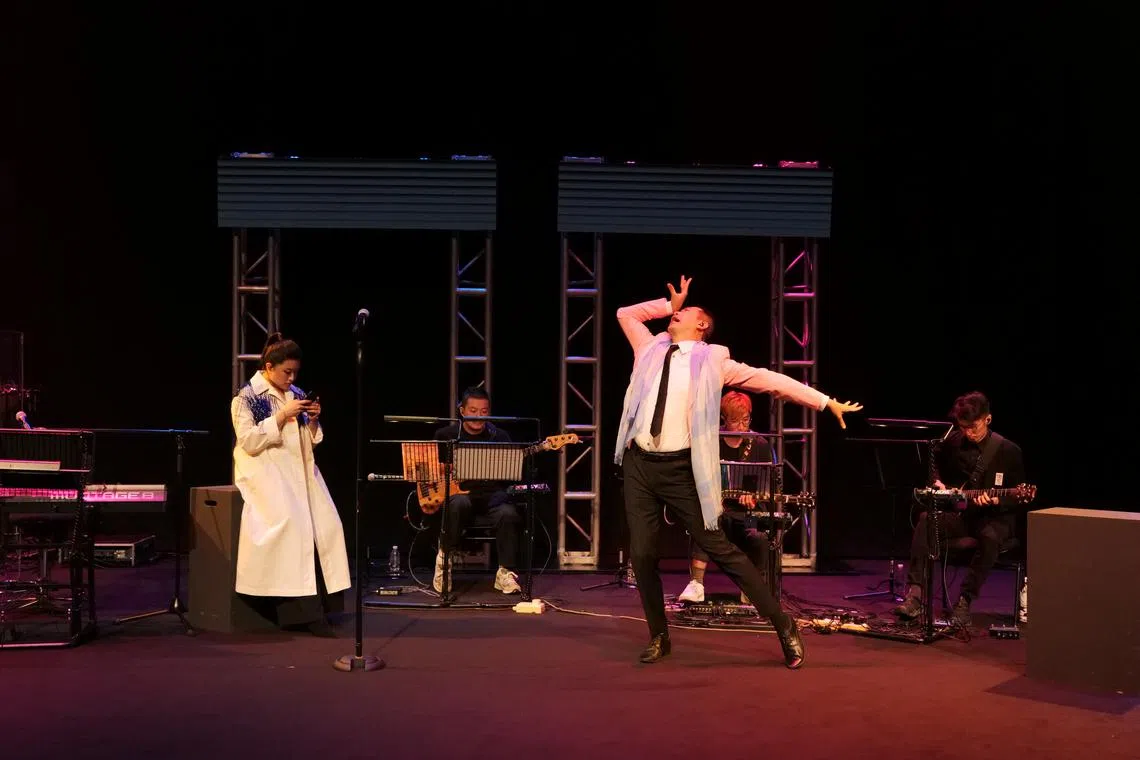 Anna Lo (left) and Rick Lau (right) barrel energetically through a series of original songs for Tri Ka Tsai. 