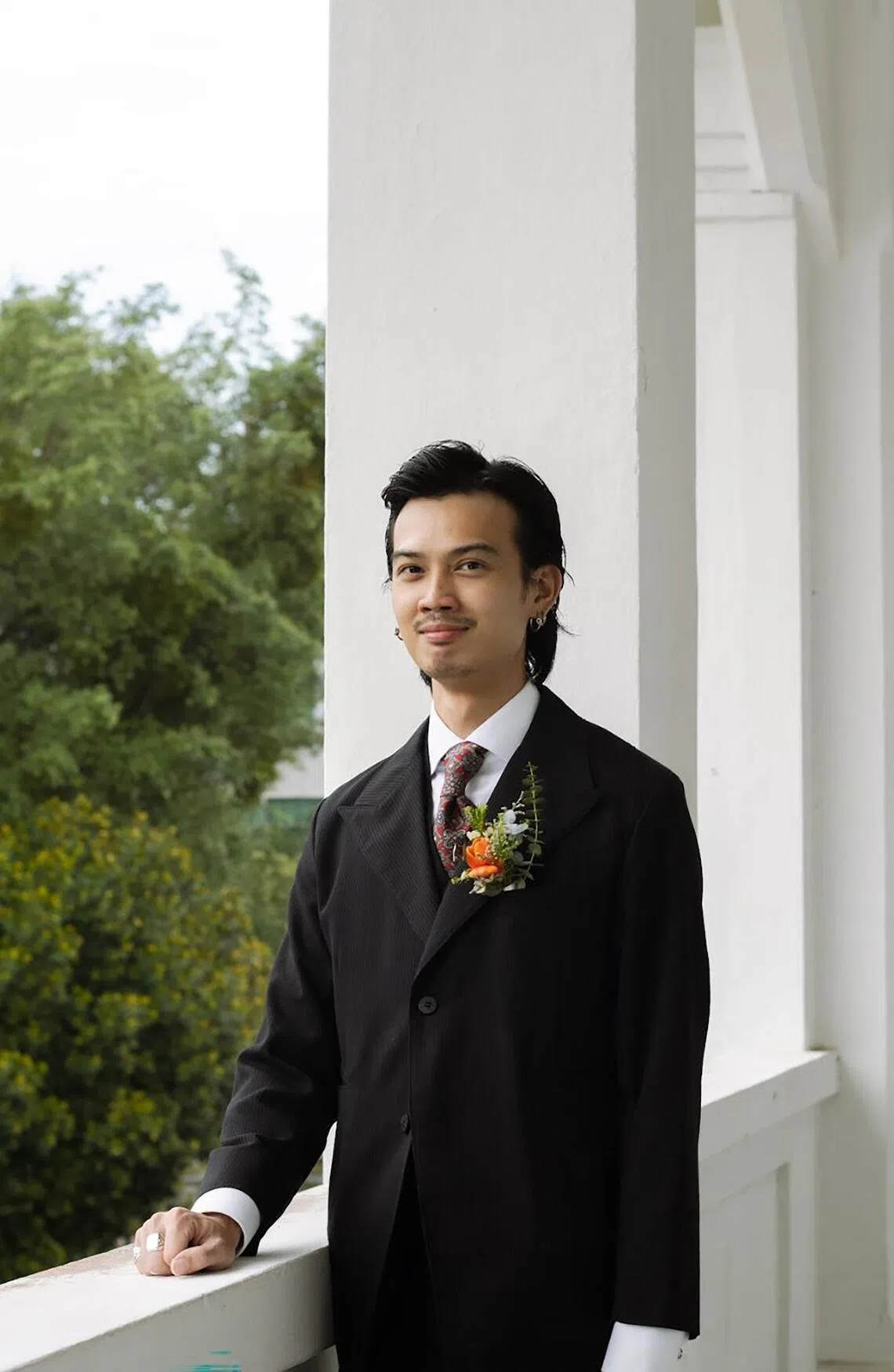 Local interior designer Vincent Li in a Black Sign suit on his wedding day.