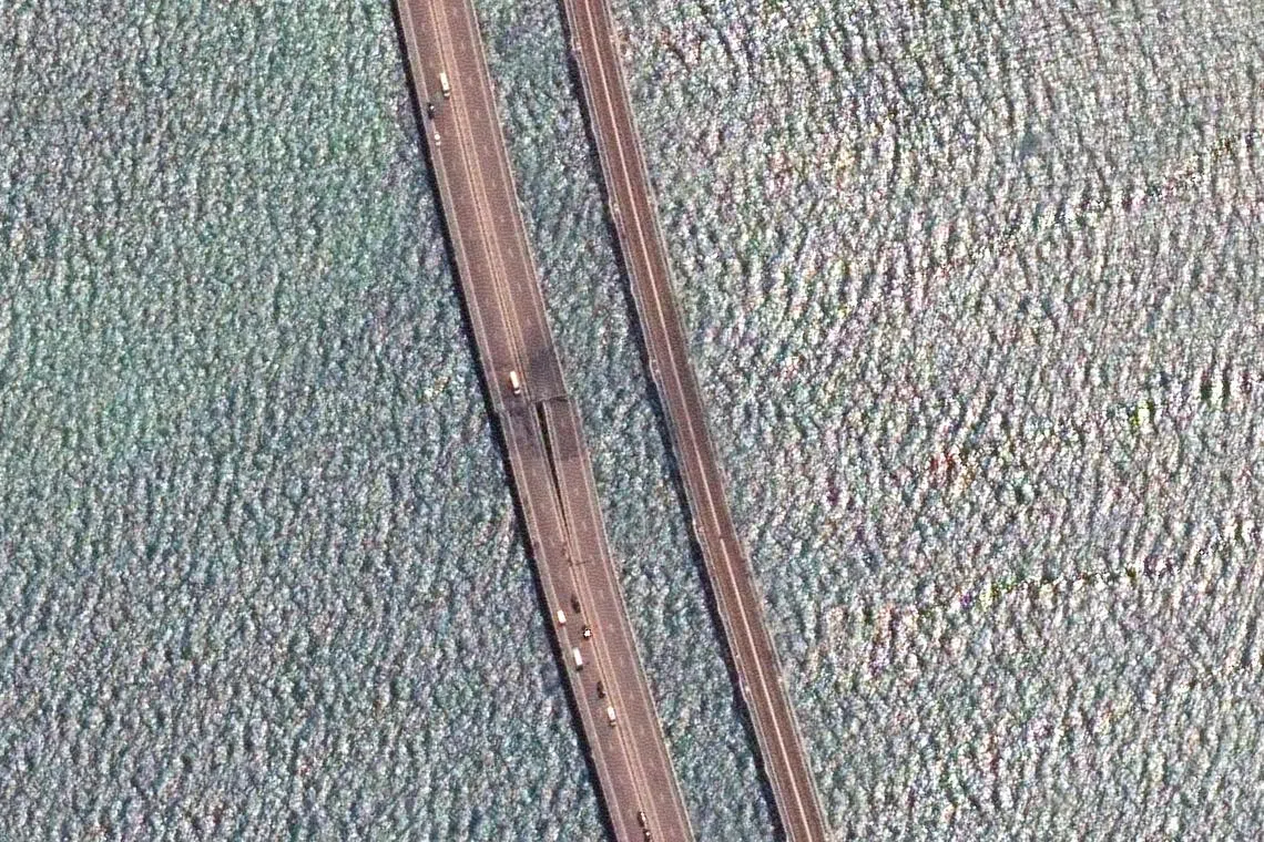 A close up view of the damaged span of the Crimea bridge in Kerch Strait.