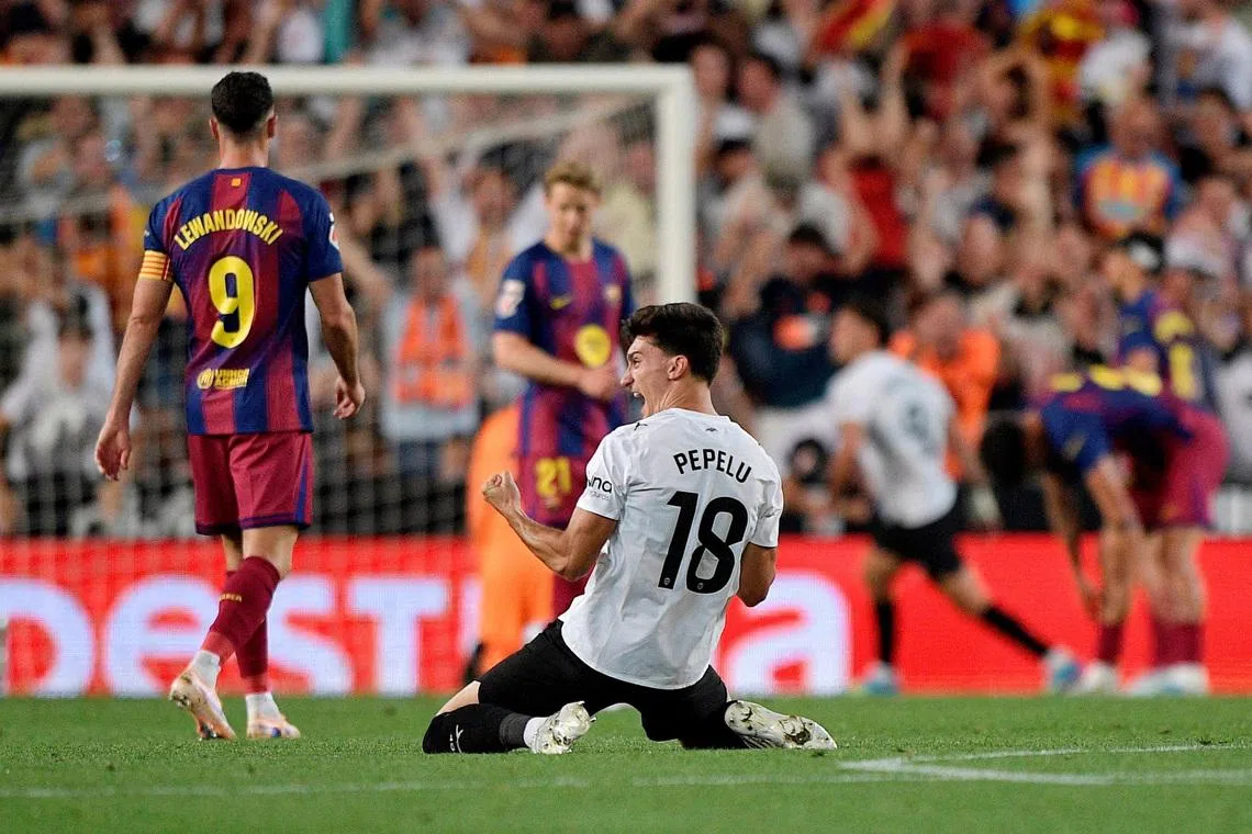 Soccer Football - LaLiga - Valencia v FC Barcelona - Estadio de Mestalla, Valencia, Spain - May 23, 2026 Valencia's Pepelu celebrates their third goal scored by Guido Rodriguez REUTERS/Pablo Morano