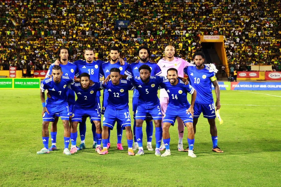 Soccer Football - FIFA World Cup - CONCACAF Qualifiers - Group B - Jamaica v Curacao - National Stadium Independence Park, Kingston, Jamaica - November 18, 2025 Curacao players pose for a team group photo before the match REUTERS/Gilbert Bellamy