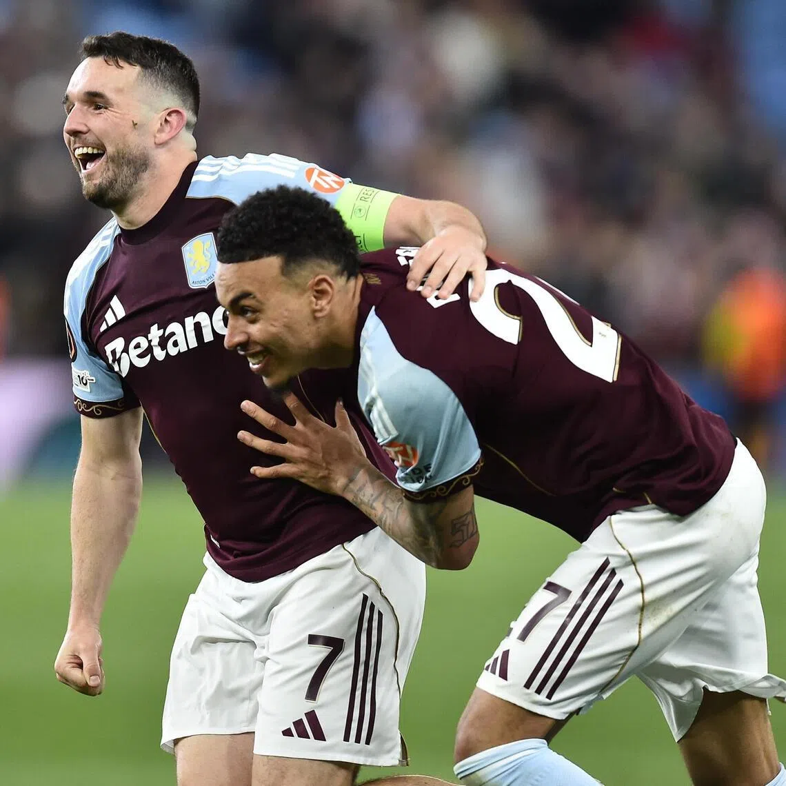 Aston Villa's John McGinn (left) and Morgan Rogers celebrate after winning their semi-final, 2nd leg match against Nottingham Forest on May 7.