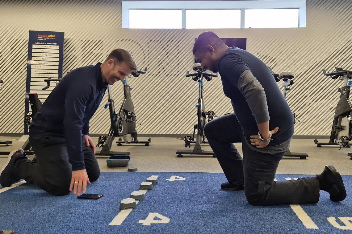 David Osgathorp, a human performance coach at Red Bull Racing explains to ST reporter Deepanraj Ganesan about the importance of reaction times in F1 as they prepare for a reaction test. 

