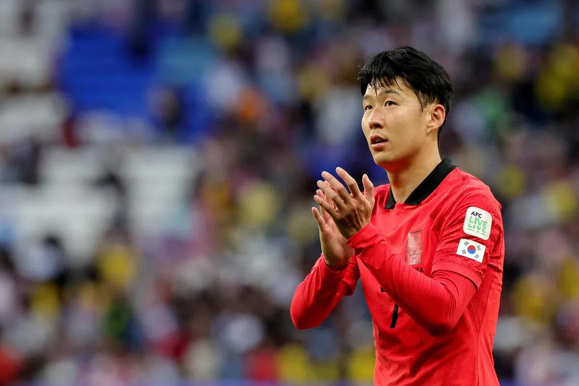 South Korea captain Son Heung-min applauds the fans following the 3-3 Asian Cup draw with Malaysia.