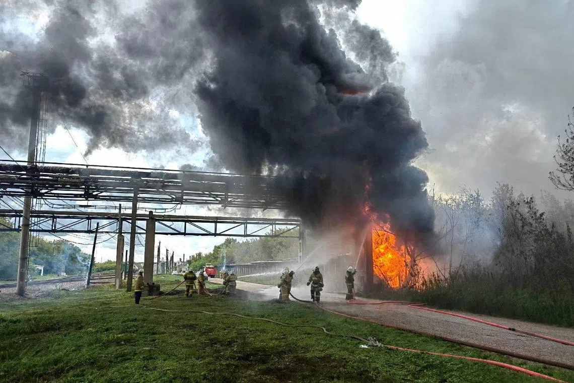 Firefighters extinguish a fire after an explosion at a fuel pipeline at the Sterlitamak petrochemical plant, in Sterlitamak in the Republic of Bashkortostan, Russia August 19, 2024. Russian Emergencies Ministry/Handout via REUTERS