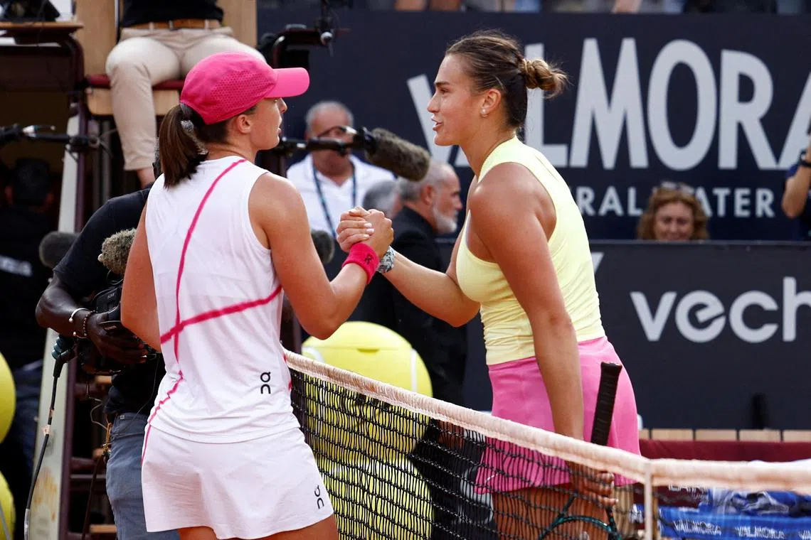 Aryna Sabalenka (right) and Iga Swiatek at the Italian Open in May 2024.