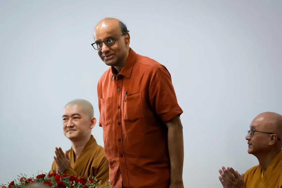 Mr Tharman Shanmugaratnam (centre) at a dialogue at Kong Meng San Phor Kark See Monastery in Bright Hill Road, Bishan, on Aug 20.