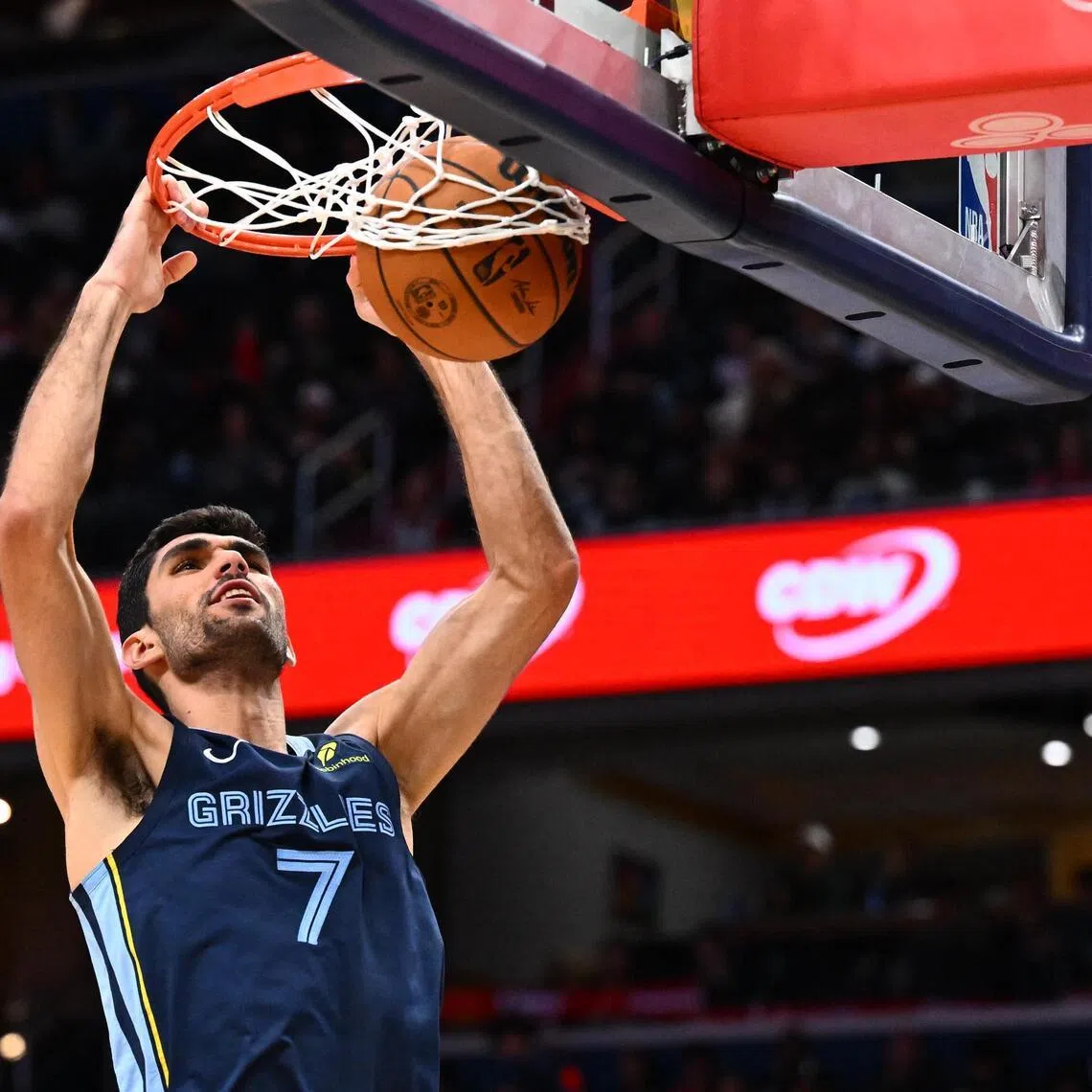 Memphis Grizzlies forward Santi Aldama dunks the ball against the Washington Wizards during the first half at Capital One Arena. 