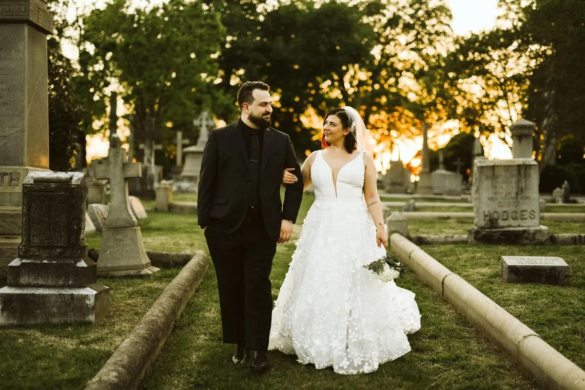 In a photo provided by True Story Photography shows, Shelby Prevatt and Zak Cowell had their wedding ceremony in 2022 at Hollywood Cemetery in Richmond, Va. Holding a wedding in a cemetery has become more commonplace. For some couples it’s deeply personal, for others strictly budgetary. (True Story Photography via The New York Times) -- NO SALES; FOR EDITORIAL USE ONLY WITH NYT STORY CEMETERY WEDDINGS BY ALEXANDER NAZARYAN FOR OCT. 31, 2024. ALL OTHER USE PROHIBITED. --