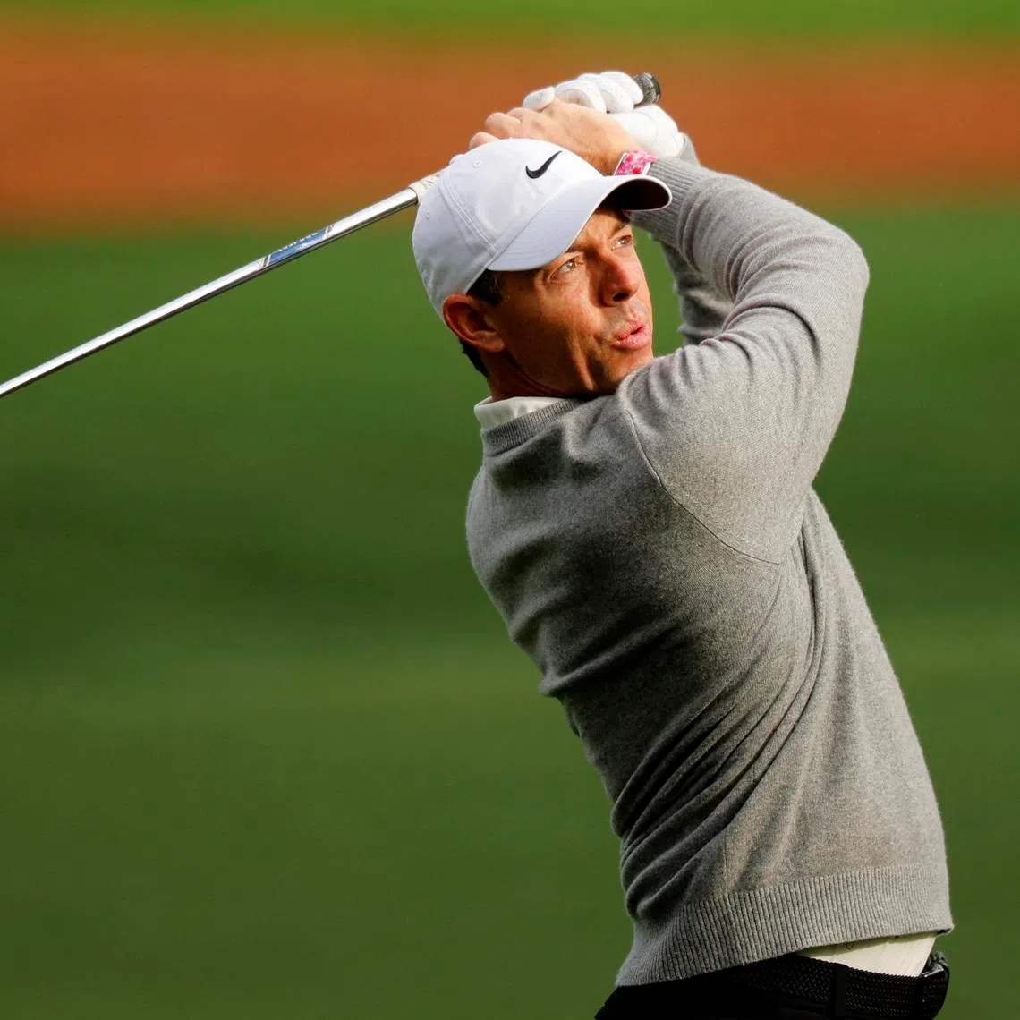 Golf - The Masters - Augusta National Golf Club, Augusta, Georgia, U.S. - April 7, 2026 Northern Ireland's Rory McIlroy plays a shot on the 7th hole during a practice round REUTERS/Mike Blake