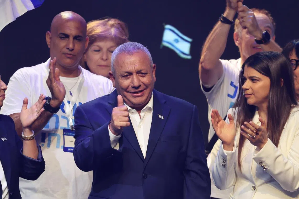 Leader of the ‘Yashar’ party, Gadi Eisenkot (centre), presents his team during the party’s election campaign launch conference in Neve Yarak, Israel.