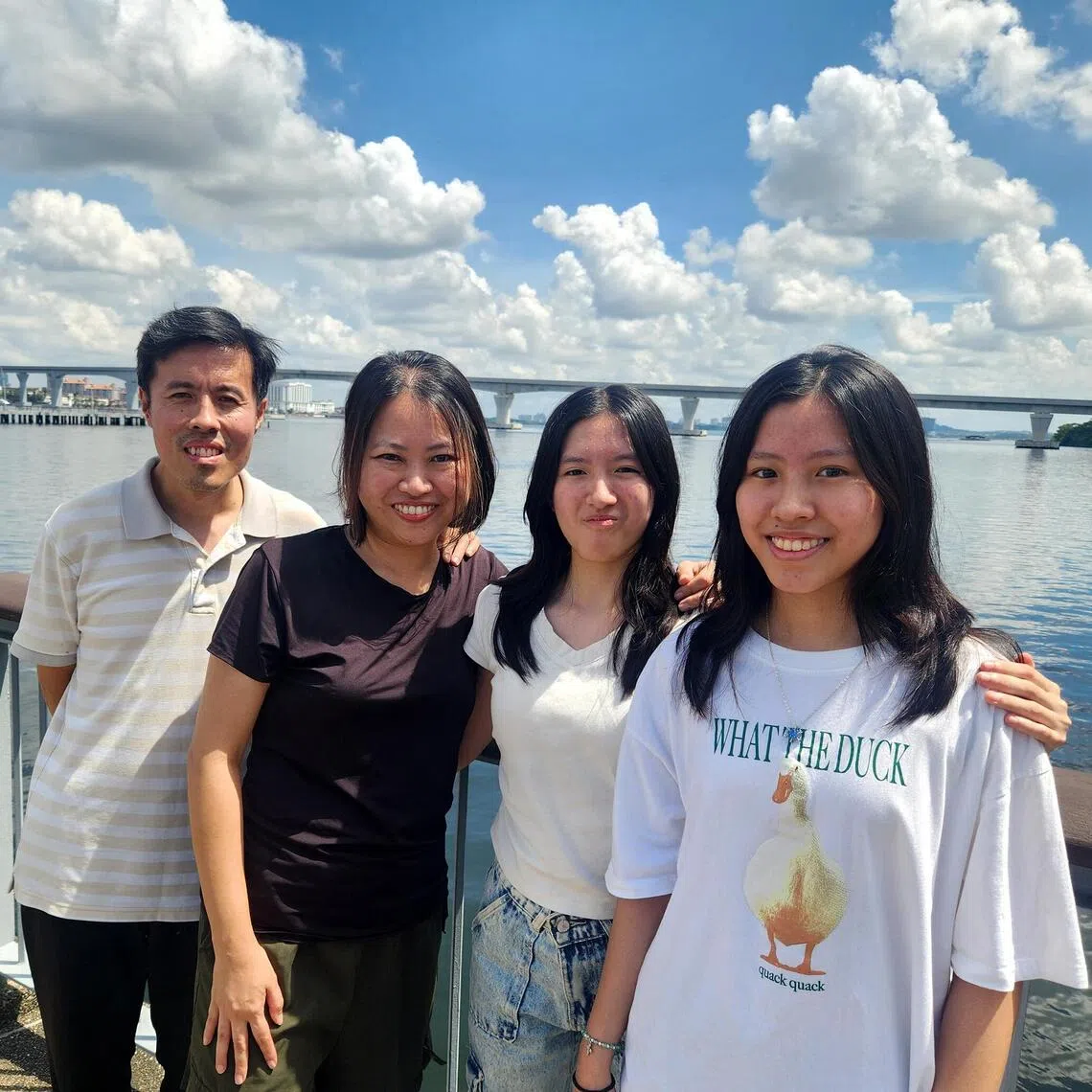 (From left) Mr Joash Liang and Ms Corrine Ang with their daughters Eleora and Elise. In pursuit of a slower, different lifestyle, they relocated first to Thailand, then to Malaysia in recent years.