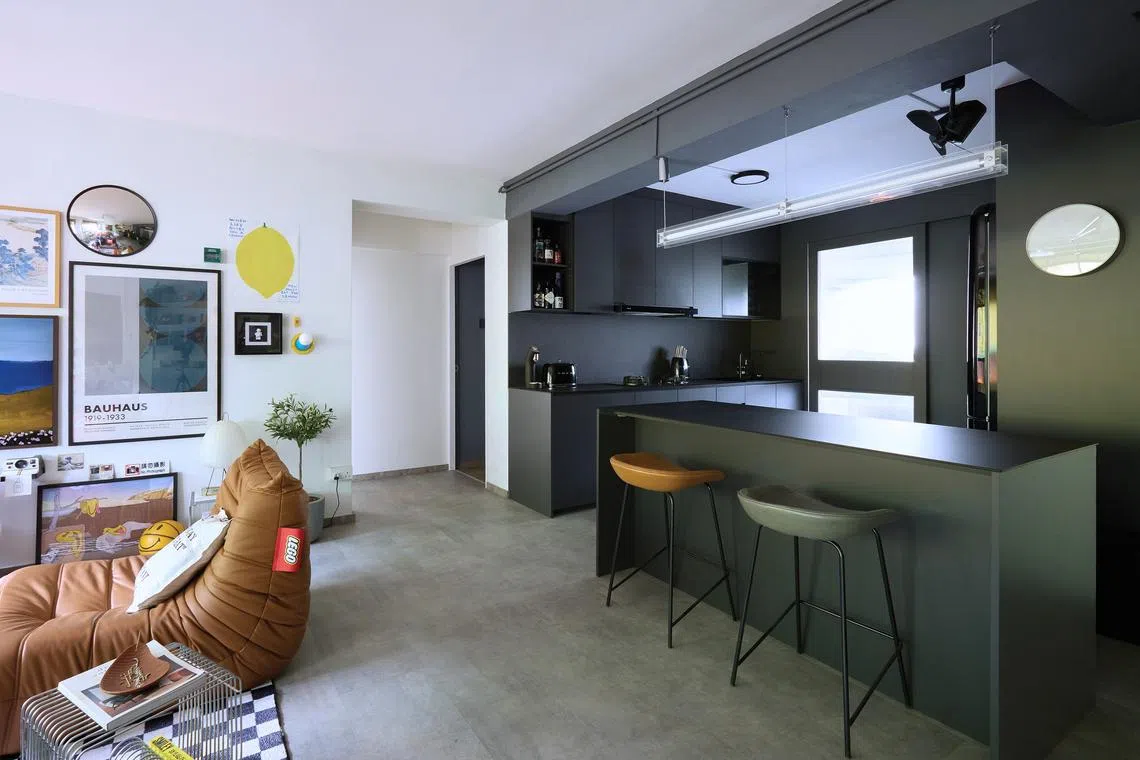 A kitchen island separates the space from the rest of the home.