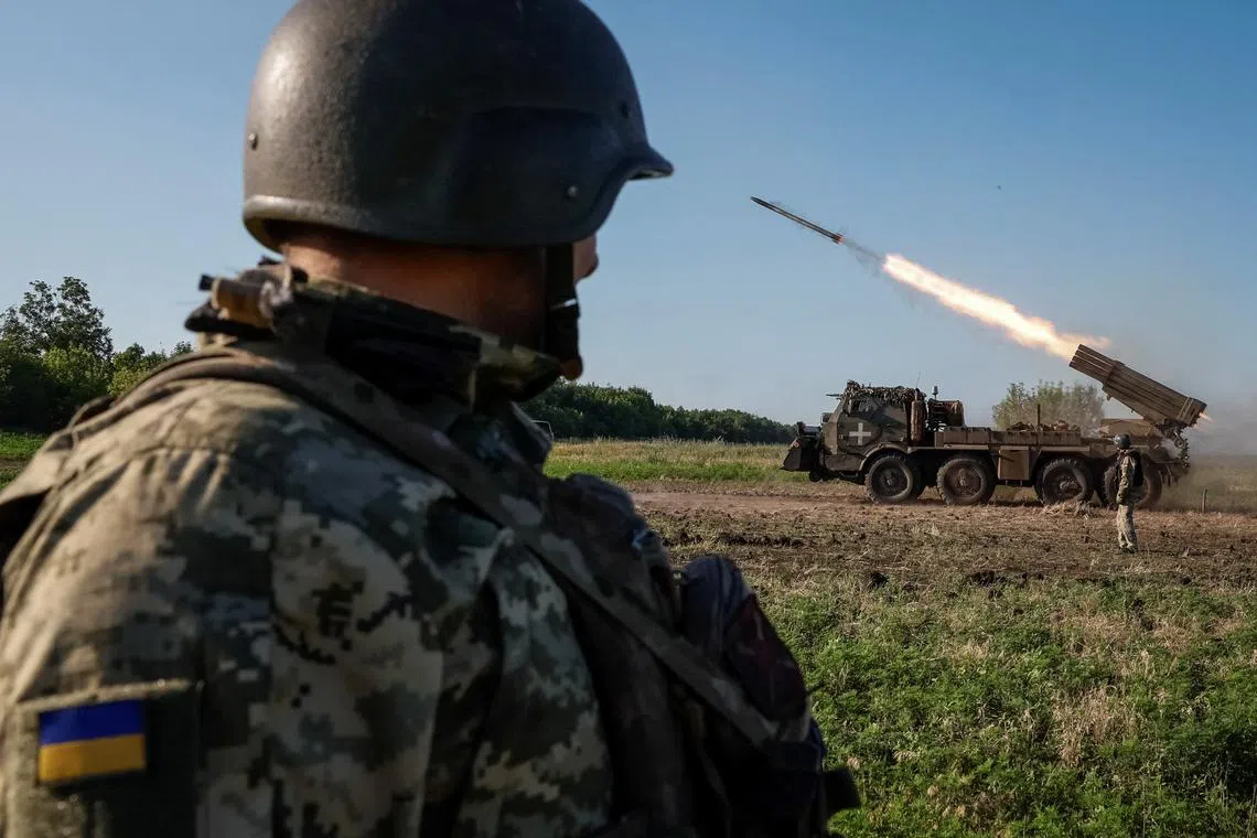 FILE PHOTO: Ukrainian service members of the 110th Colonel-General Marko Bezruchko Separate Mechanized Brigade fire an RM-70 Vampire multiple launch rocket system towards Russian troops, amid Russia's attack on Ukraine, at a position near a front line in Donetsk region, Ukraine June 30, 2024. REUTERS/Alina Smutko/File Photo