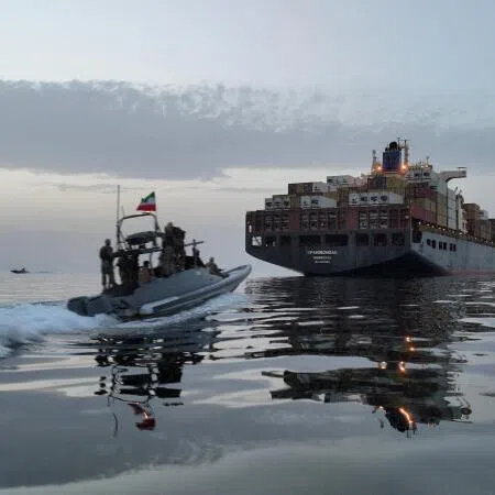 Iran's Islamic Revolutionary Guard Corps seen seizing a ship in the Strait of Hormuz in an image obtained on April 24, 2026.