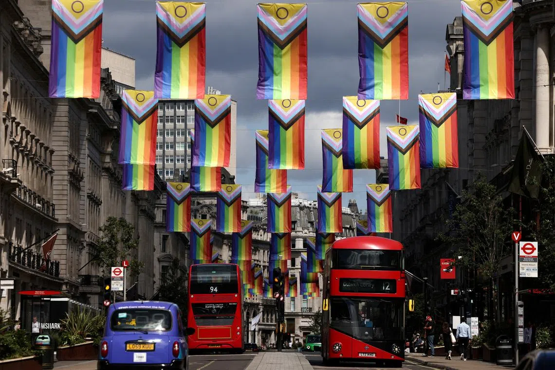 FILE PHOTO: Intersex-Inclusive Pride flags, designed by Valentino Vecchietti and used to represent the LGBTIQ+ community, hang across Regent Street ahead of next weeks Pride parade in London, Britain, June 26, 2022. REUTERS/Henry Nicholls/File Photo