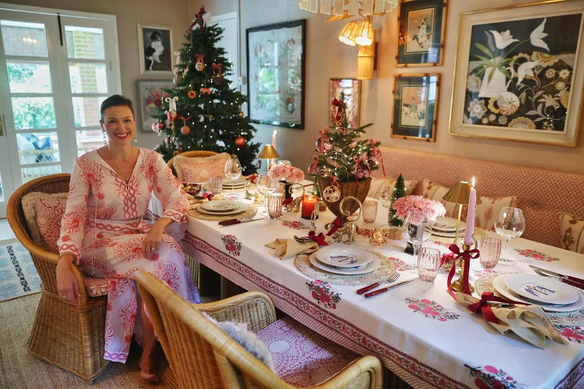 Juliane Bailey, founder of The Jungle Emporium, showing her design of the Maximalist Look for Christmas entertaining.