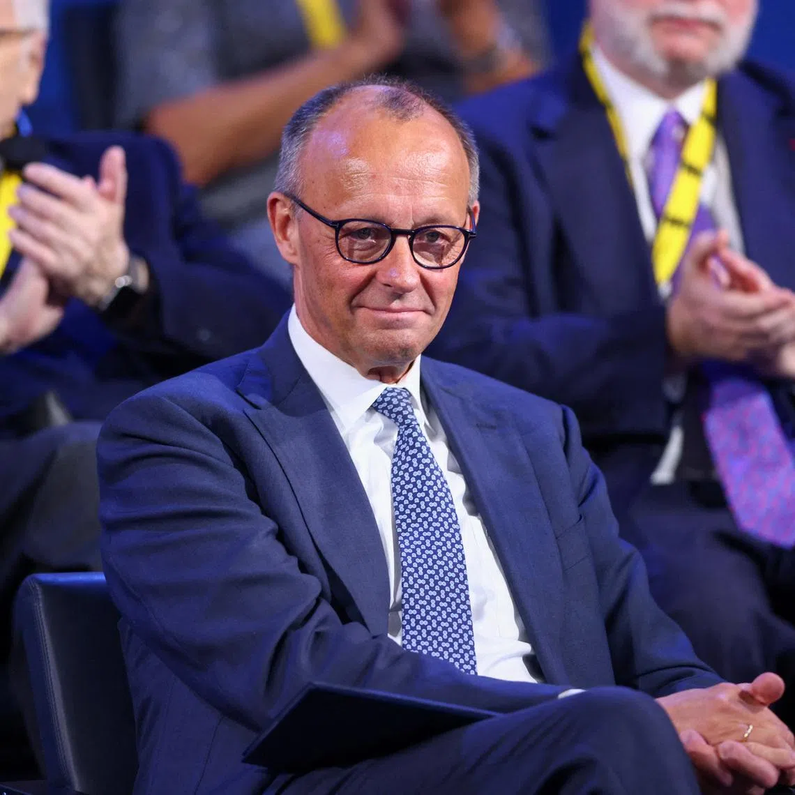 German Chancellor Friedrich Merz attends a ceremony to award European Central Bank (ECB) former President and Italian former Prime Minister Mario Draghi the International Charlemagne Prize (Karlspreis) 2026, in Aachen, Germany, May 14, 2026.    REUTERS/Thilo Schmuelgen