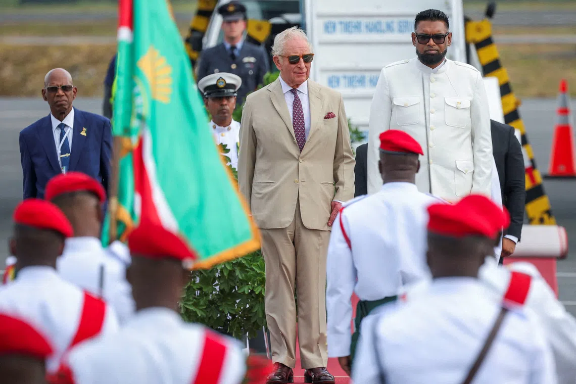 Britain's King Charles meets with Guyana's President Mohamed Irfaan Ali upon arrival in Guyana for a state visit during a tour of Caribbean nations that will also take him to Antigua and Barbuda for the Commonwealth Heads of Government Meeting (CHOGM), at the Cheddi Jagan International Airport (GEO) in Timehri, Guyana, October 29, 2026. REUTERS/Isabel Infantes