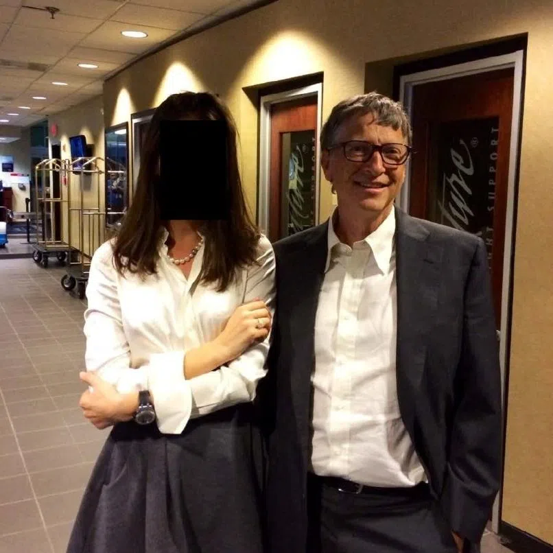 Bill Gates appears with a woman, who's identity has been obscured, in this image from the Epstein estate released by House Oversight Committee Democrat.
