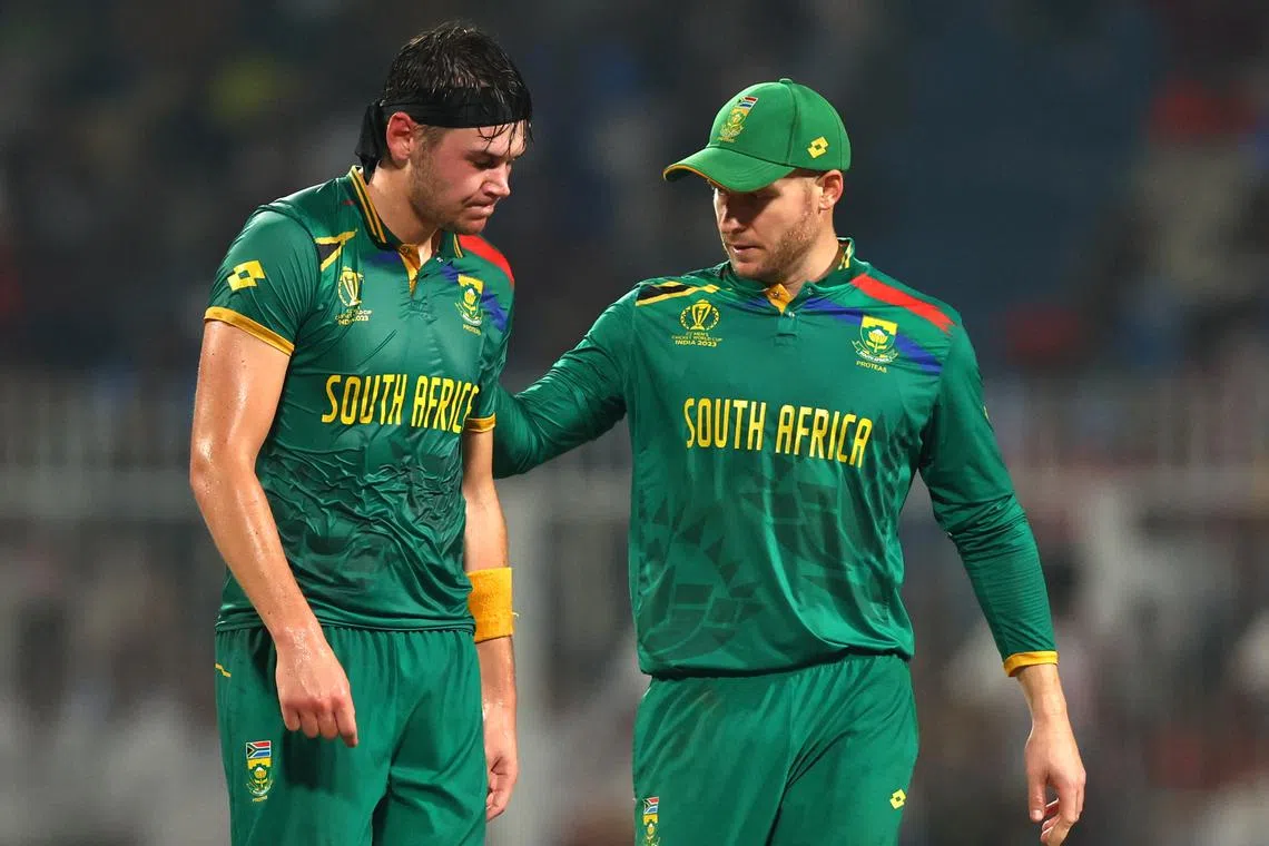 FILE PHOTO: Cricket - ICC Cricket World Cup 2023 - Semi-Final - South Africa v Australia - Eden Gardens, Kolkata, India - November 16, 2023 South Africa's David Miller and Gerald Coetzee during the match REUTERS/Andrew Boyers/File Photo