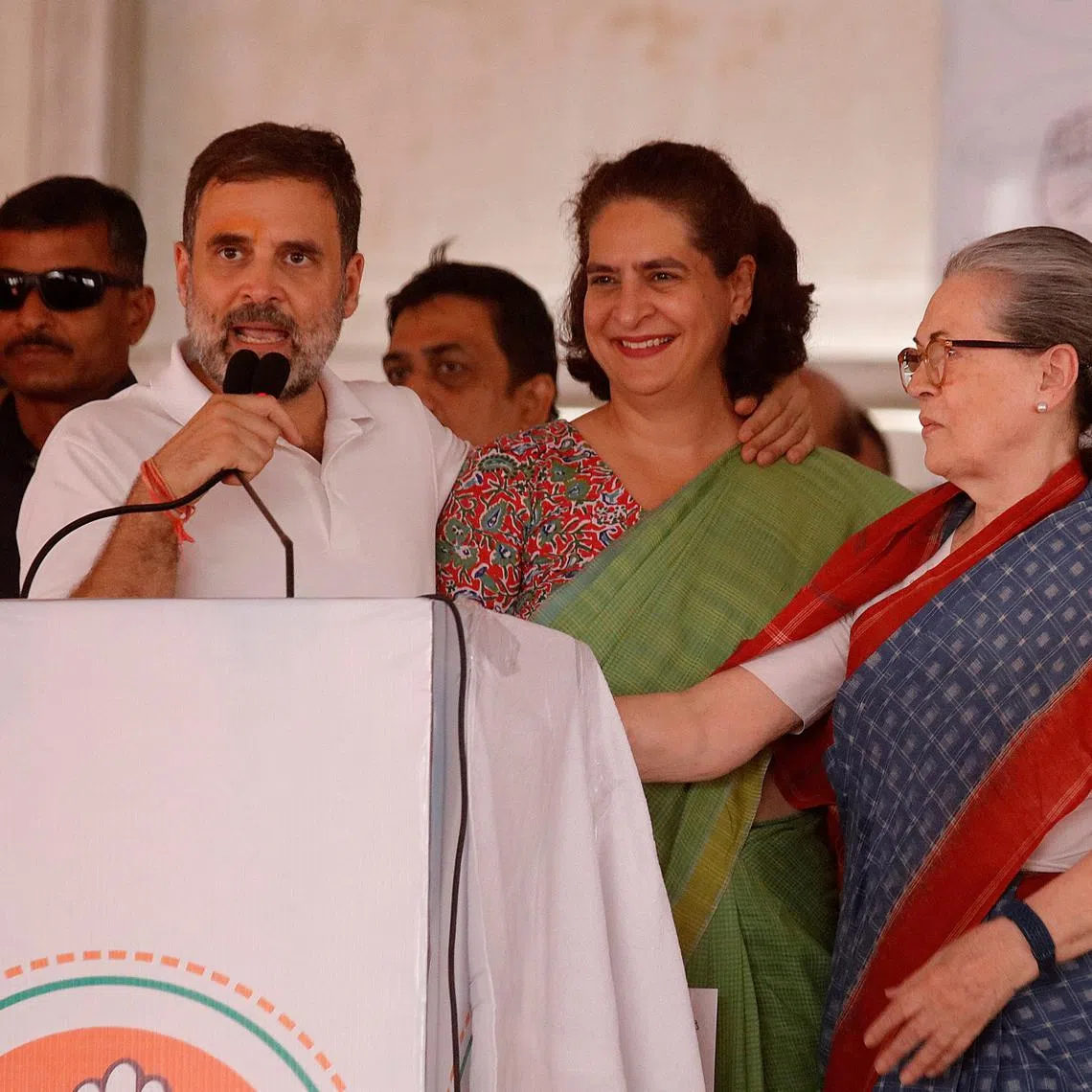 Rahul Gandhi, a senior leader of India's main opposition Congress party, addresses his supporters as his sister Priyanka Gandhi Vadra, and their mother Sonia Gandhi look on during an election campaign rally in Raebareli in the state of Uttar Pradesh, India, May 17, 2024. REUTERS/Pawan Kumar