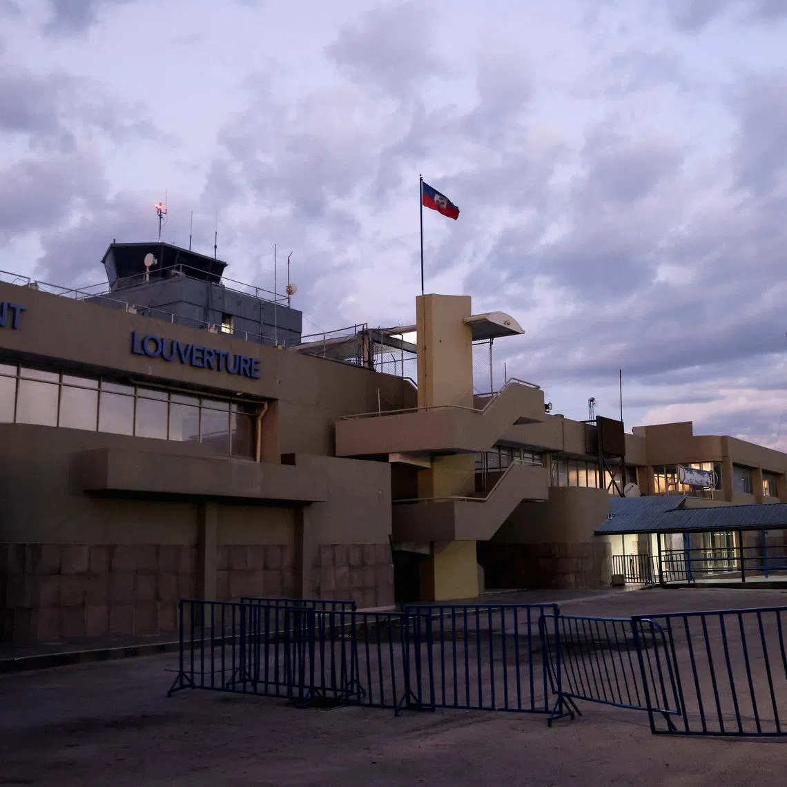 A view of Toussaint Louverture International Airport, which was shut since last month and has been reopened by Haitian authorities, even as the U.S. Federal Aviation Administration watchdog extended a ban on U.S. airlines flying there, in Port-au-Prince, Haiti, December 11, 2024. REUTERS/Ralph Tedy Erol