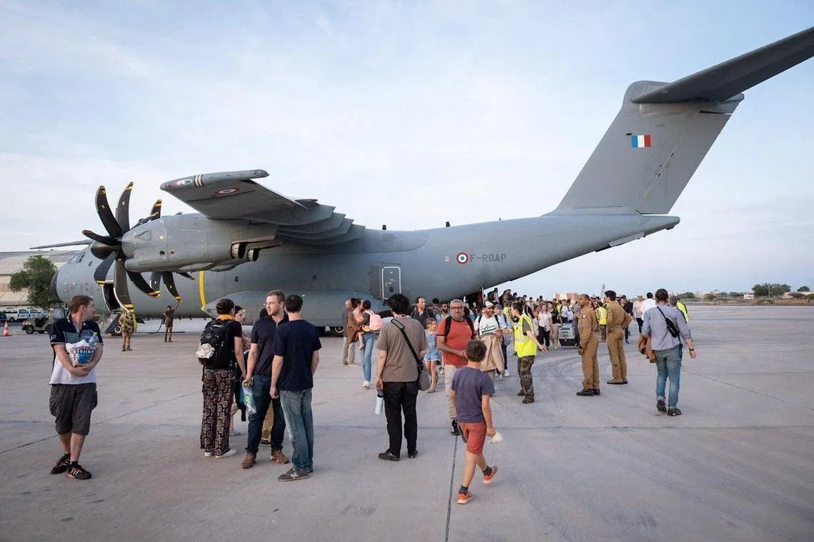 An aircraft from the French Air Force, which picked up evacuees of different nationalities from Sudan, arrives in Djibouti, according to French President Emmanuel Macron's official Twitter account, in this undated handout image released on April 23, 2023.  French President Emmanuel Macron via Twitter/Handout via REUTERS   ATTENTION EDITORS - THIS IMAGE HAS BEEN SUPPLIED BY A THIRD PARTY. NO RESALES. NO ARCHIVES. MANDATORY CREDIT