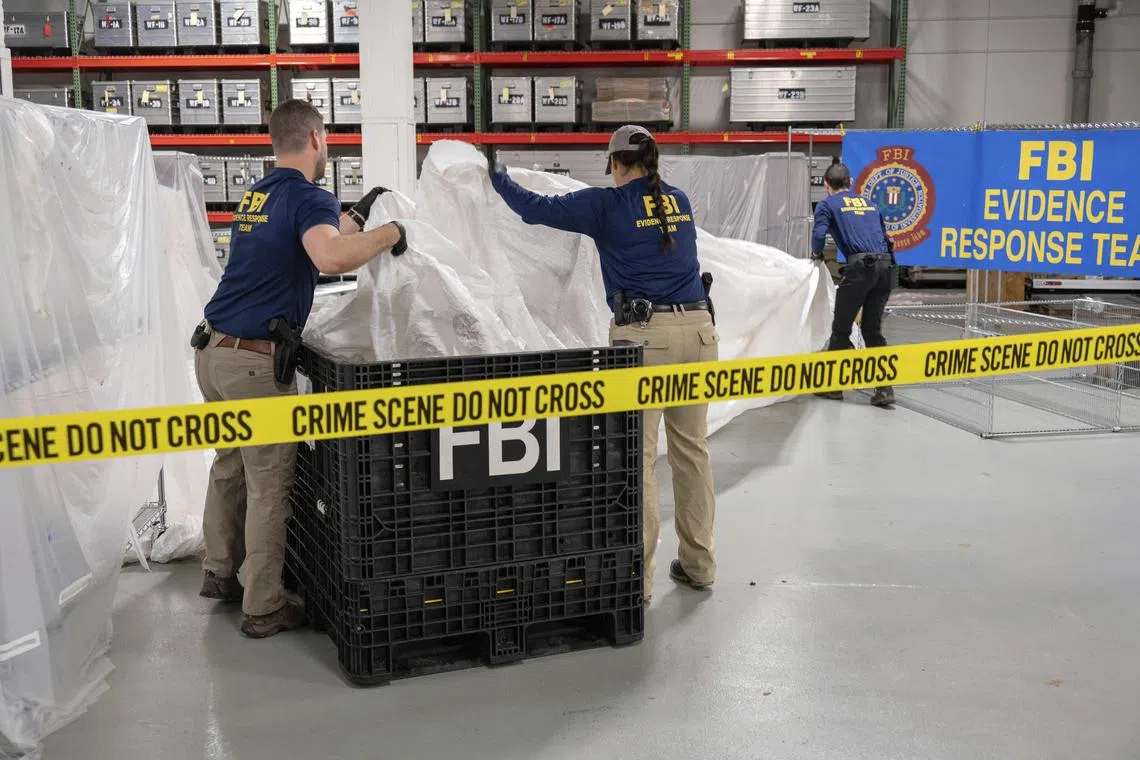 FBI special agents processing remnants from the Chinese balloon at a laboratory in Quantico, Virginia, on Feb. 9, 2023.