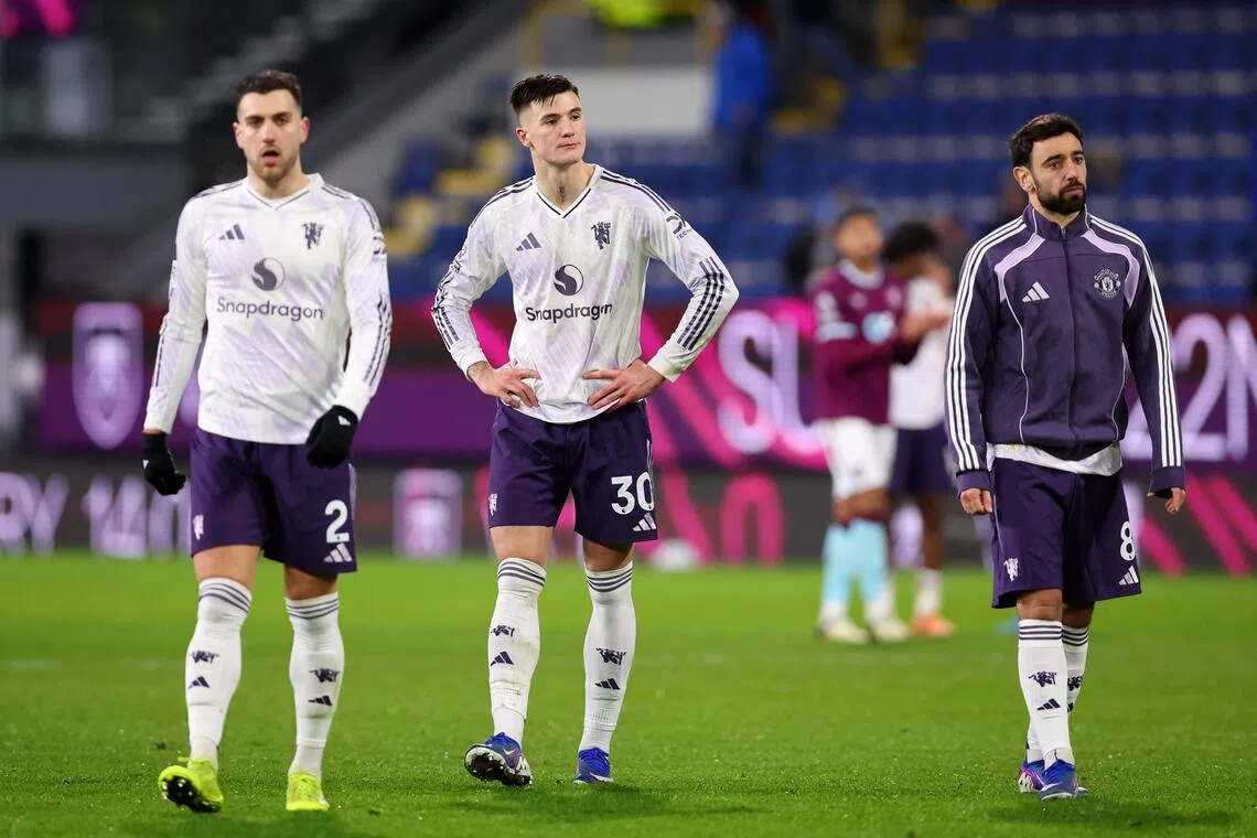 Manchester United's Diogo Dalot, Benjamin Sesko and Bruno Fernandes after the match.