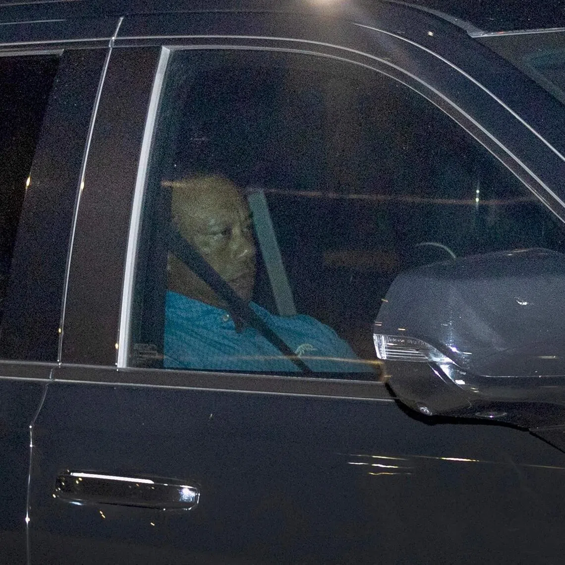 Tiger Woods being driven from the Martin County Jail after being arrested for driving under the influence after a car crash on March 27, 2026 in Stuart, Florida.
