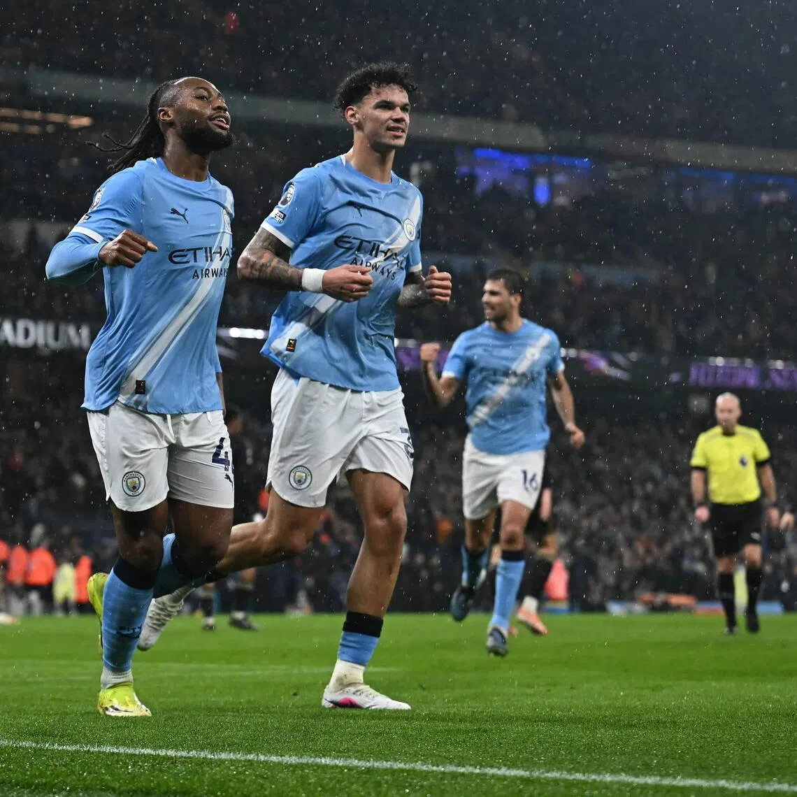 Manchester City's Antoine Semenyo celebrates scoring their first goal with Nico O'Reilly, who went on to score their second with Semenyo's help.