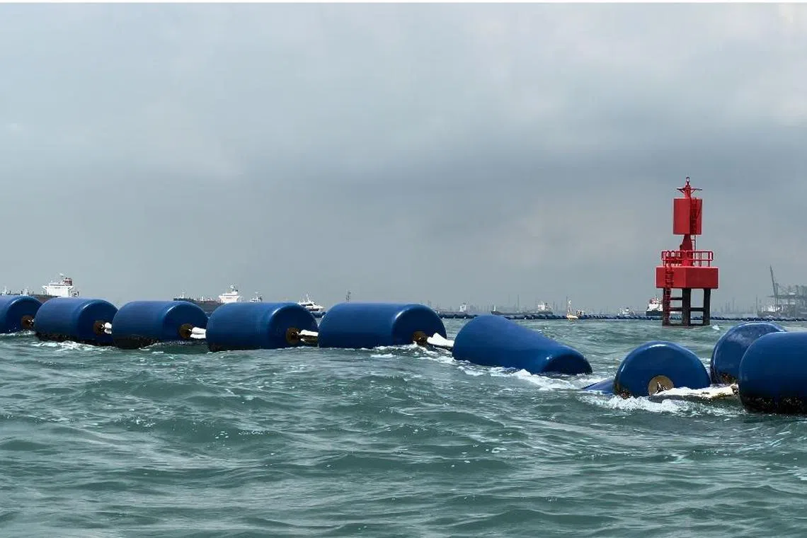The spot where the missing woman capsized was near the line of floating sea barriers.